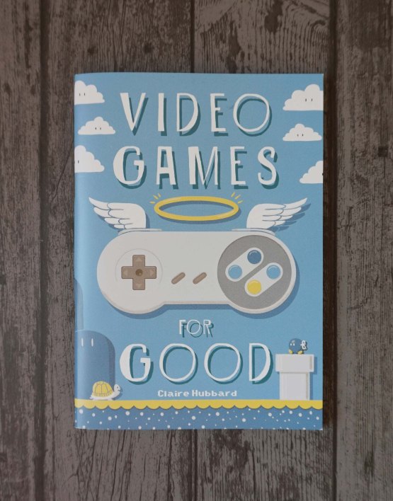 Das Titelbild von Video Games for Good zeigt enen Super Nintendo Controller mit Heiligenschein und Flügelchen.